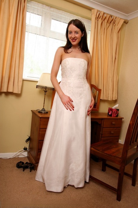 UK housewife dons her wedding dress before spreading her moist pussy 47384248