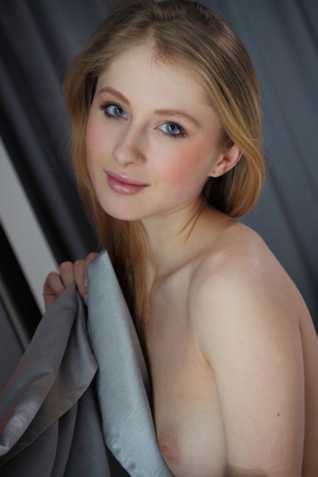 Natural blond Daisy A removes a black bikini to pose nude in her bedroom 72805922