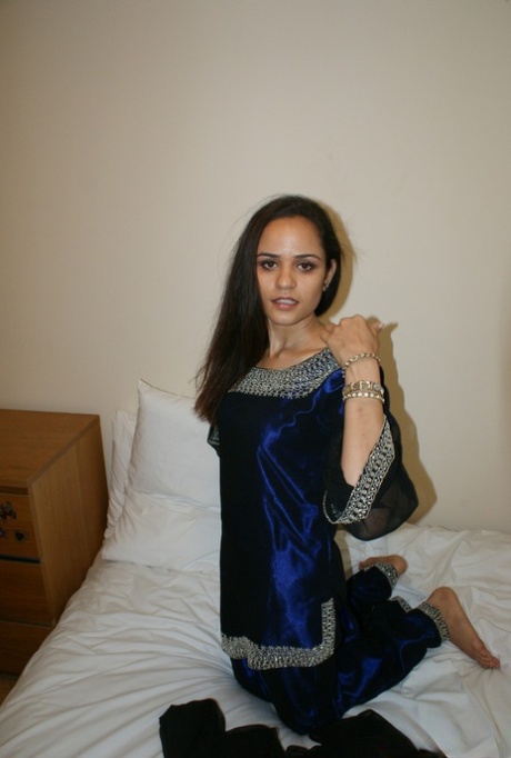 Indian solo girl cups her natural tits on a bed while in her underwear 28425929