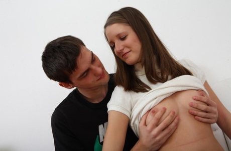 Nice teen and her boyfriend get undressed before having sex on a futon 35343959