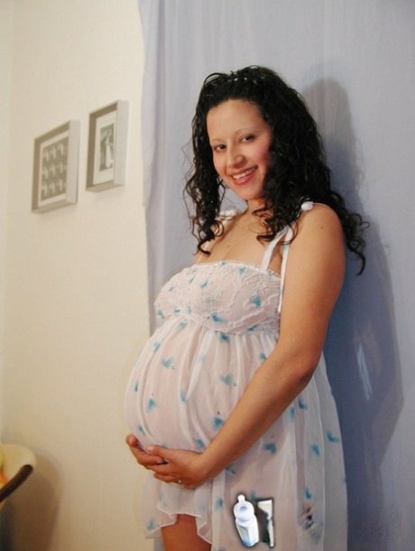 Pregnant Latina chick licks a nipple during upskirt action 44572165