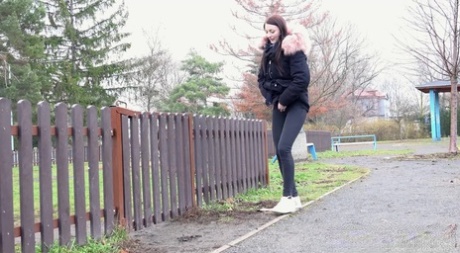 Caucasian girl Katy Sky ducks behind a picket fence for a badly needed pee 20639799