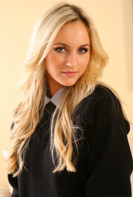 Blonde student Natasha Anastasia sets her perky tits free in tan stockings 21616286