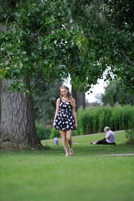 Blonde chick Hayley Marie Coppin gets totally naked by a tree in a park 31942430