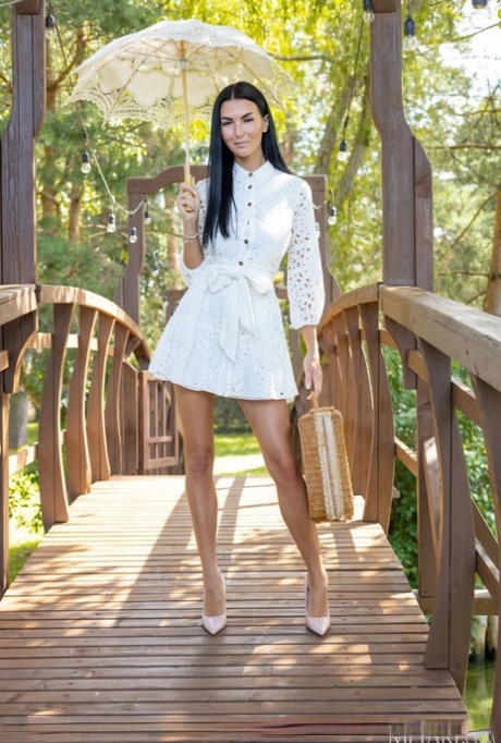 Dark haired teen Simon Kitty unveils her great body on a pedestrian footbridge 27517638