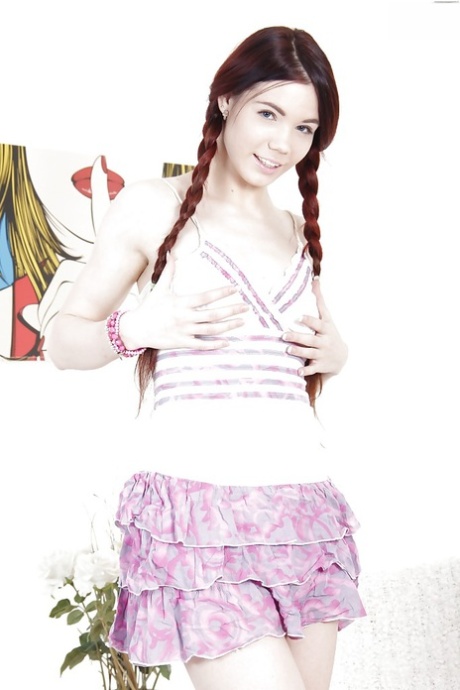 Pigtail attired Euro hottie Lovenia Lux masturbating and toying in socks 40098814