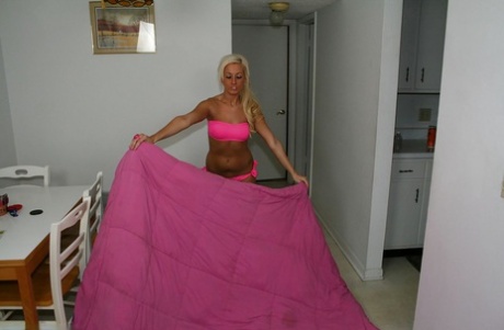 Seductive mature blonde babe stripping and gives a great handjob 59538054